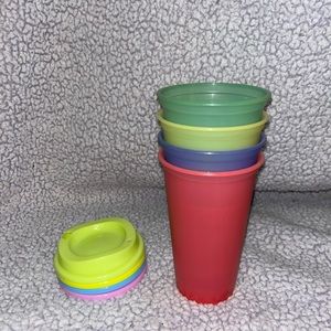 Generic sippy cups. Never been used. 4 cups with matching lids.